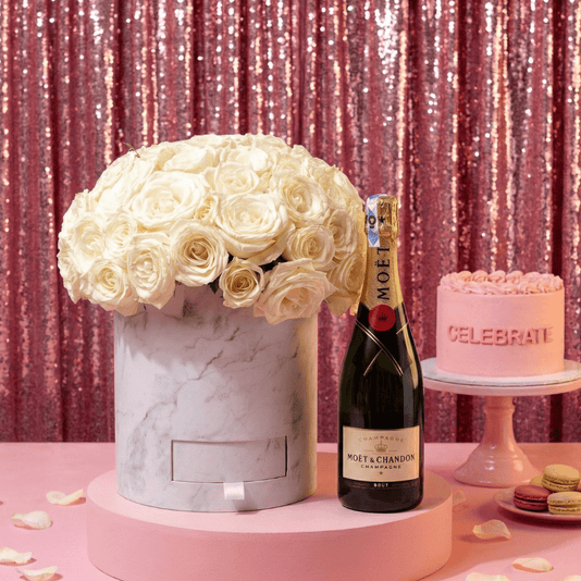 The Signature Blanc, 100 white roses with Moët champagne and cake